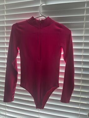 Women’s Long Sleeve Ribbed One-Piece Bodysuit in Fuchsia Pink